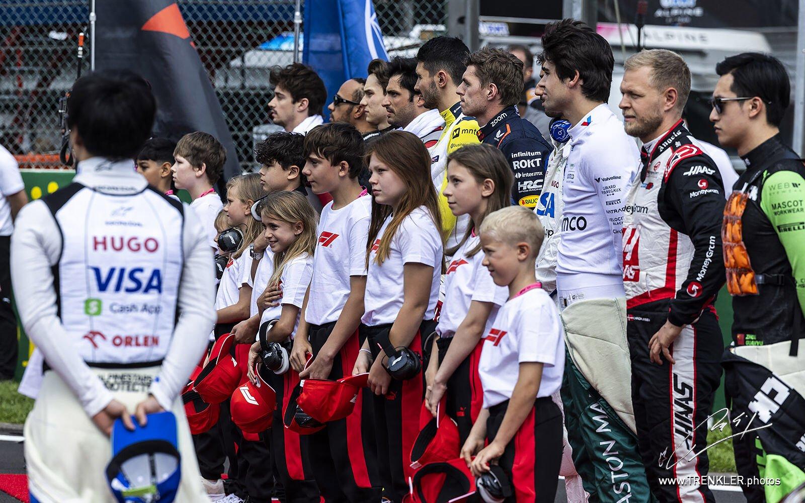 PIloti F1 pred hymnou, Grid kids