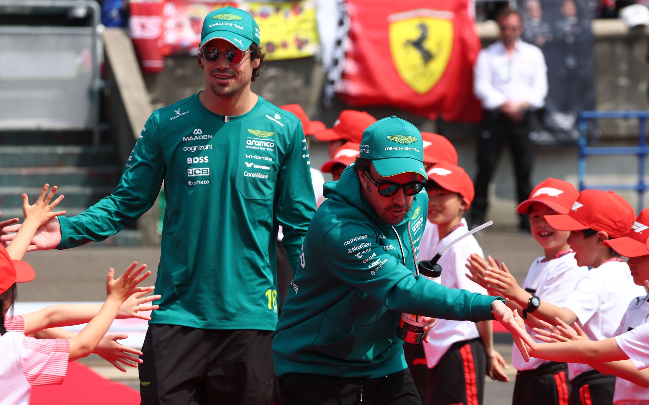 Lance Stroll a Fernando Alonso