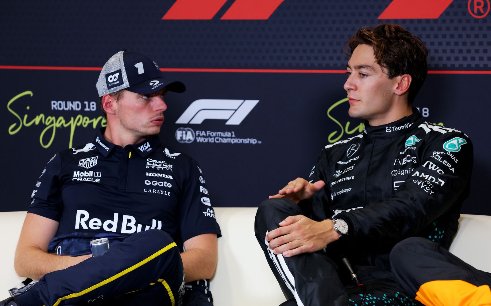 Max Verstappen a George Russell